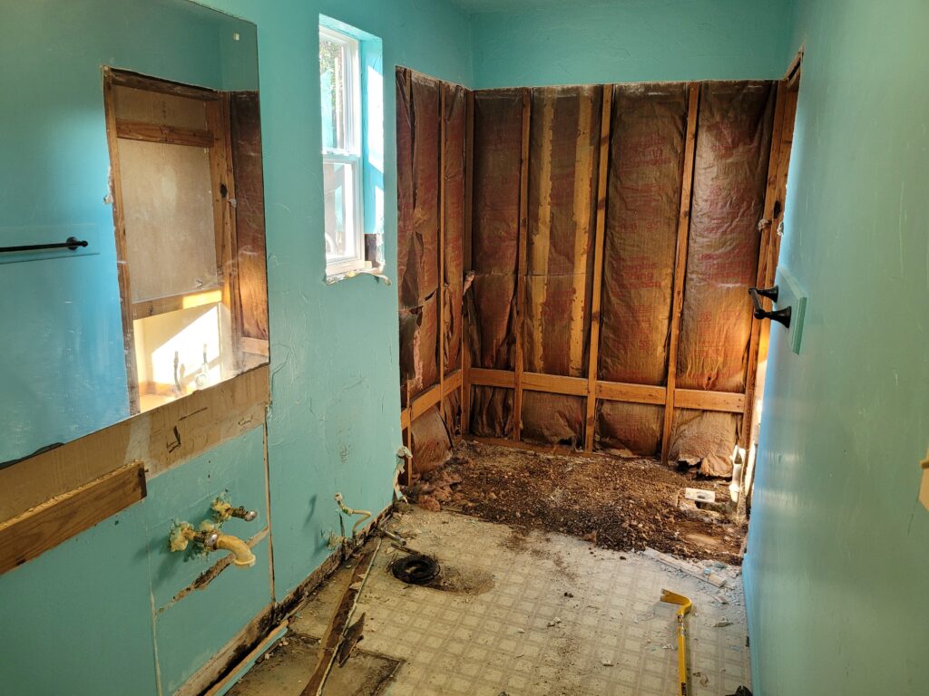 old bathroom that has been gutted